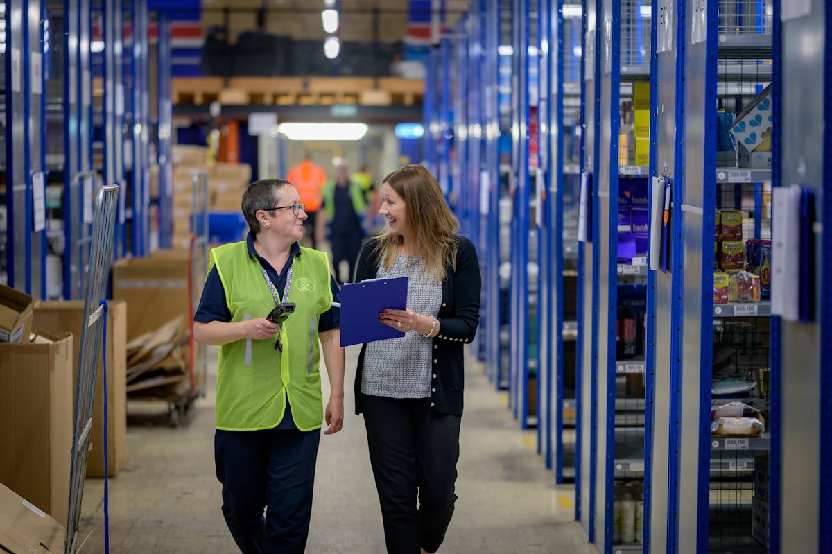 Warehouse team reviewing documents